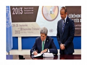 Secretary of State, John Kerry, signing away America's freedom, security and longevity.